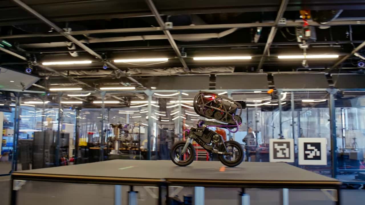 A robot and motorcycle in Raj’s personal machine archive