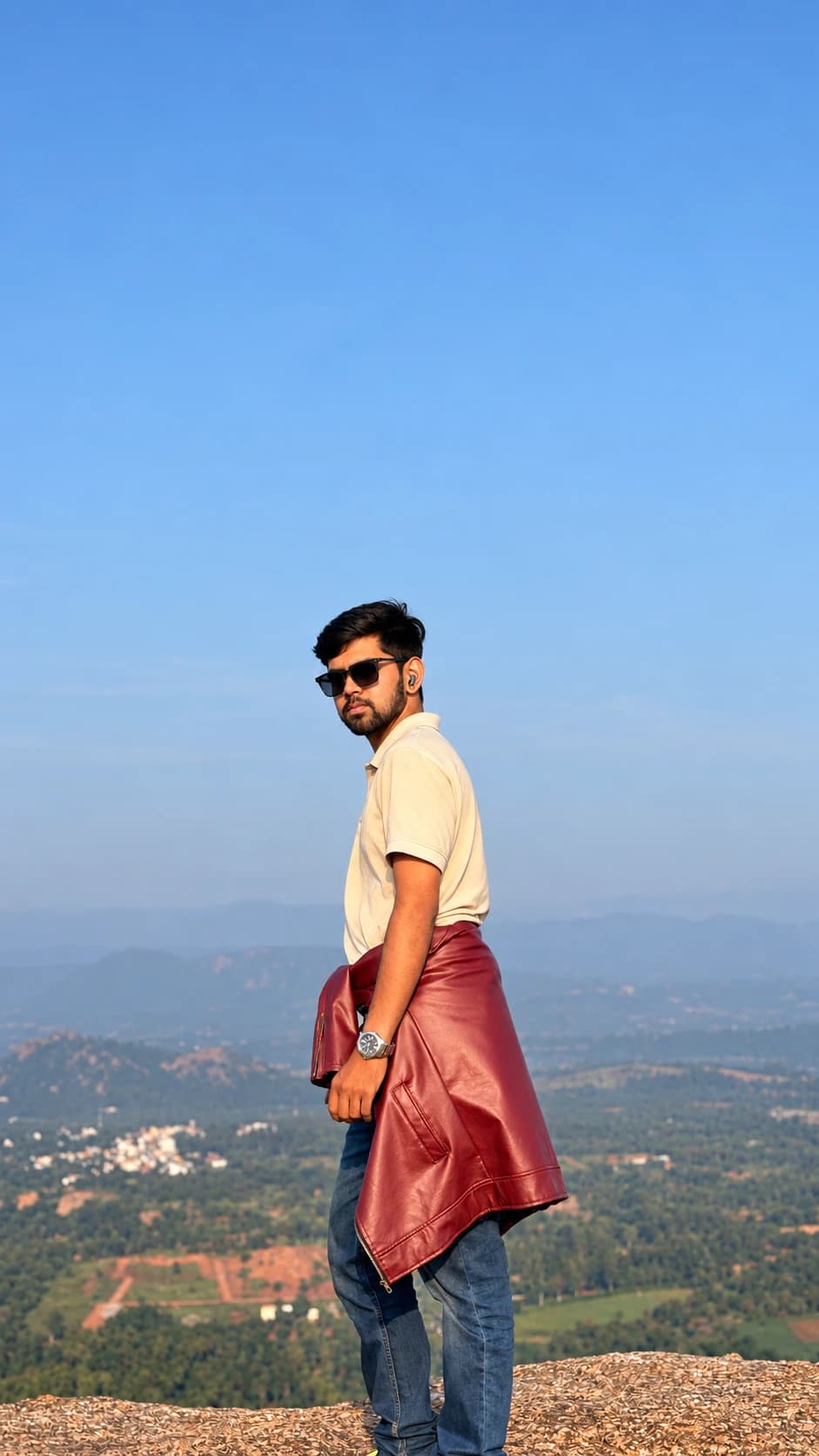 Prudhvi Raj standing above Bengaluru, Nandi Hills.